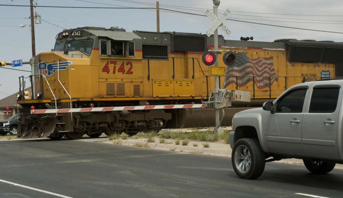Midland Police team with Union Pacific RR Tuesday afternoon to promote safety at railroad crossings. Tim Fischer\Reporter-Telegram