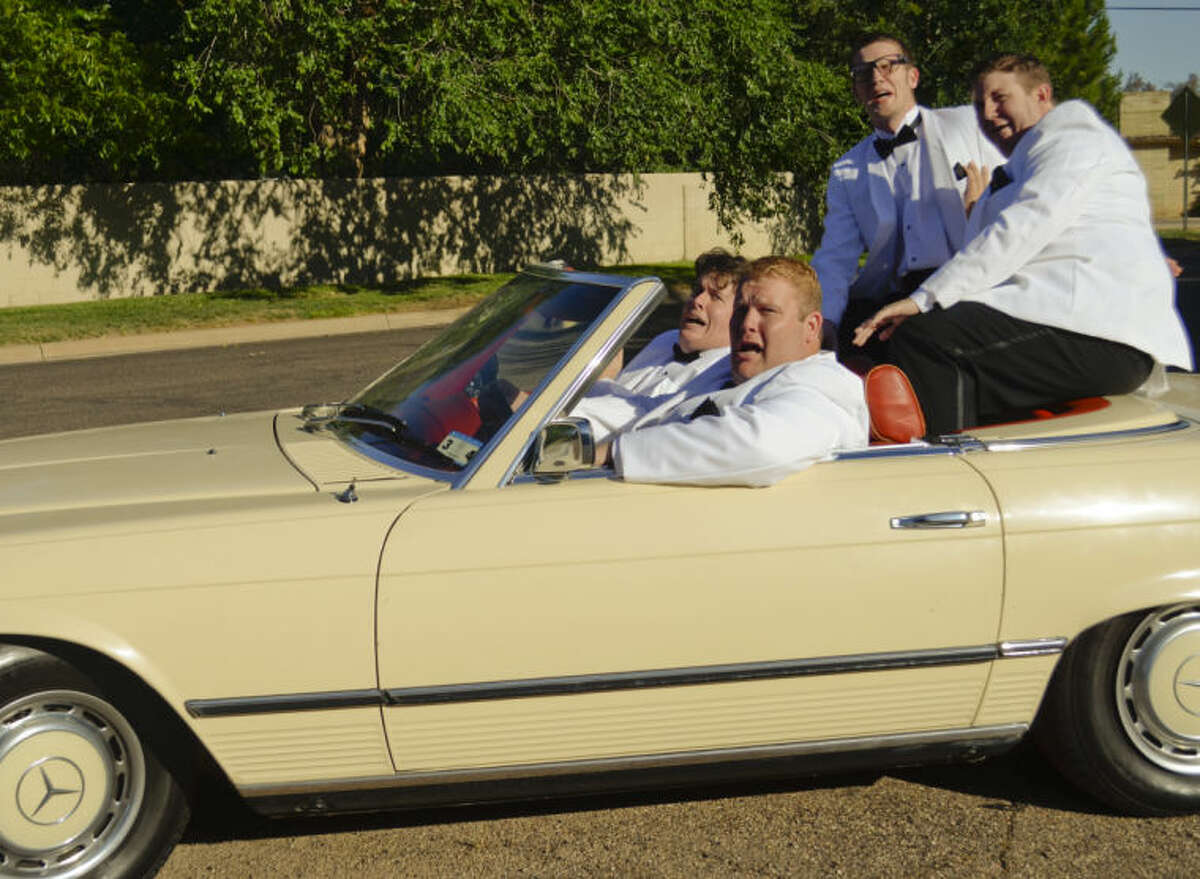 Scott Windham, driving, as Francis, Brian Gravelle, passenger as Jinx, Danny Anderson as Sparky and Drew Henry as Smudge, react as their car is hit by a bus full of nuns in MCT's production of Forever Plaid. Tim Fischer\Reporter-Telegram