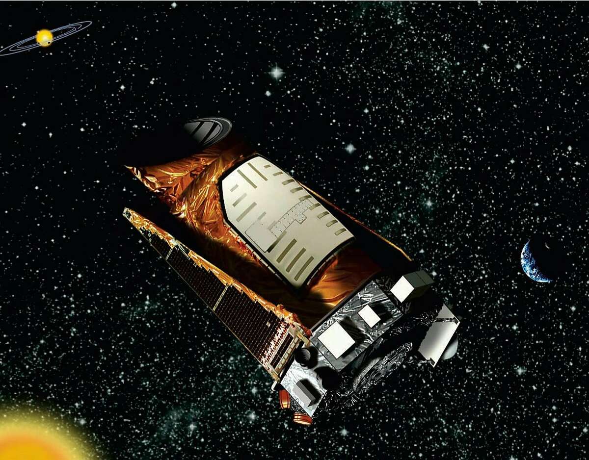 This artist rendition provided by NASA shows the Kepler space telescope. The spacecraft lost the second of four wheels that control the telescope’s orientation in space, NASA said Wednesday, May 15, 2013. If engineers can’t find a fix, the failure means the telescope won’t be able to look for planets outside our solar system anymore. (AP Photo/NASA)