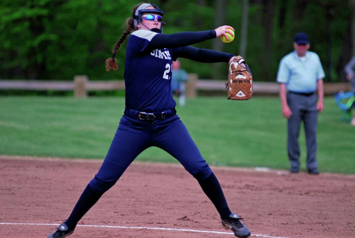 Staples pitcher Emily Lustbader tosses a pitch during a game against New Canaan Tuesday.