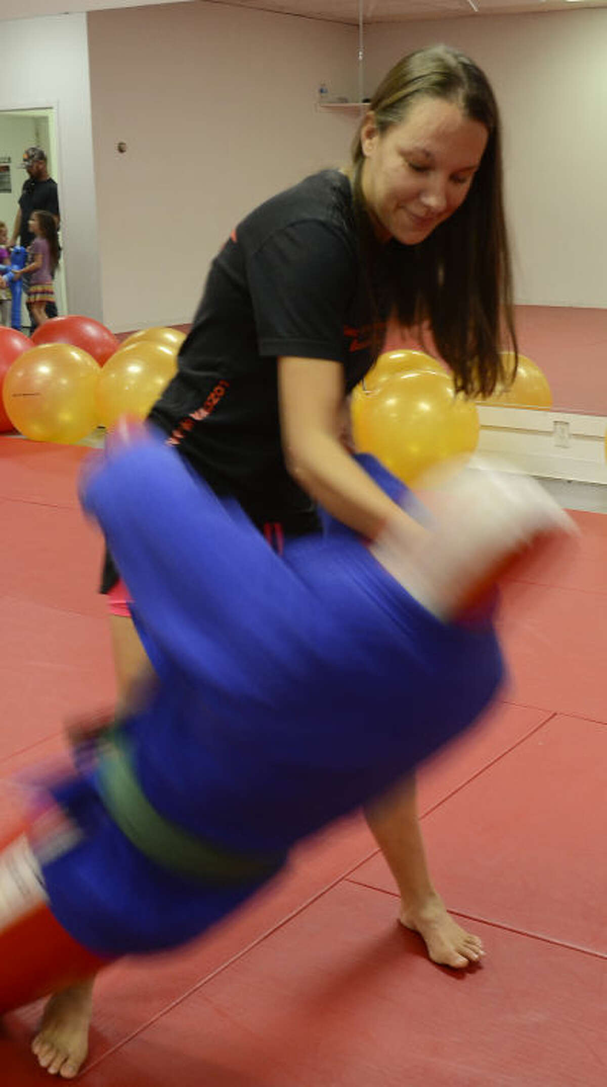 Tosha West, who suffers from muscular dystrophy, has started taking Brazilian jiu jitsu and seen a vast improvement in her muscular condition and balance. Tim Fischer\Reporter-Telegram
