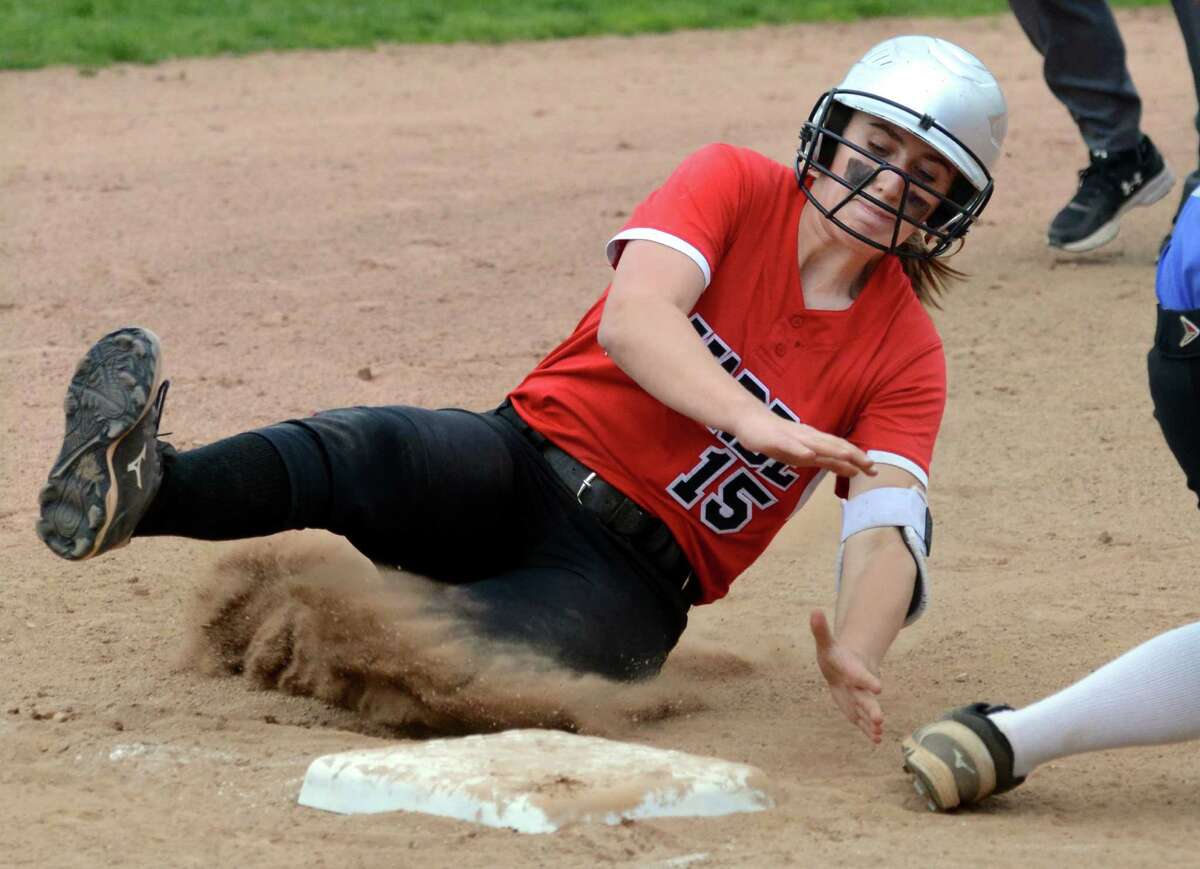 Fairfield Warde's Sophia Sancho slides into third during softball action against Fairfield Ludlowe in Fairfield, Conn., on Tuesday May 10, 2016.