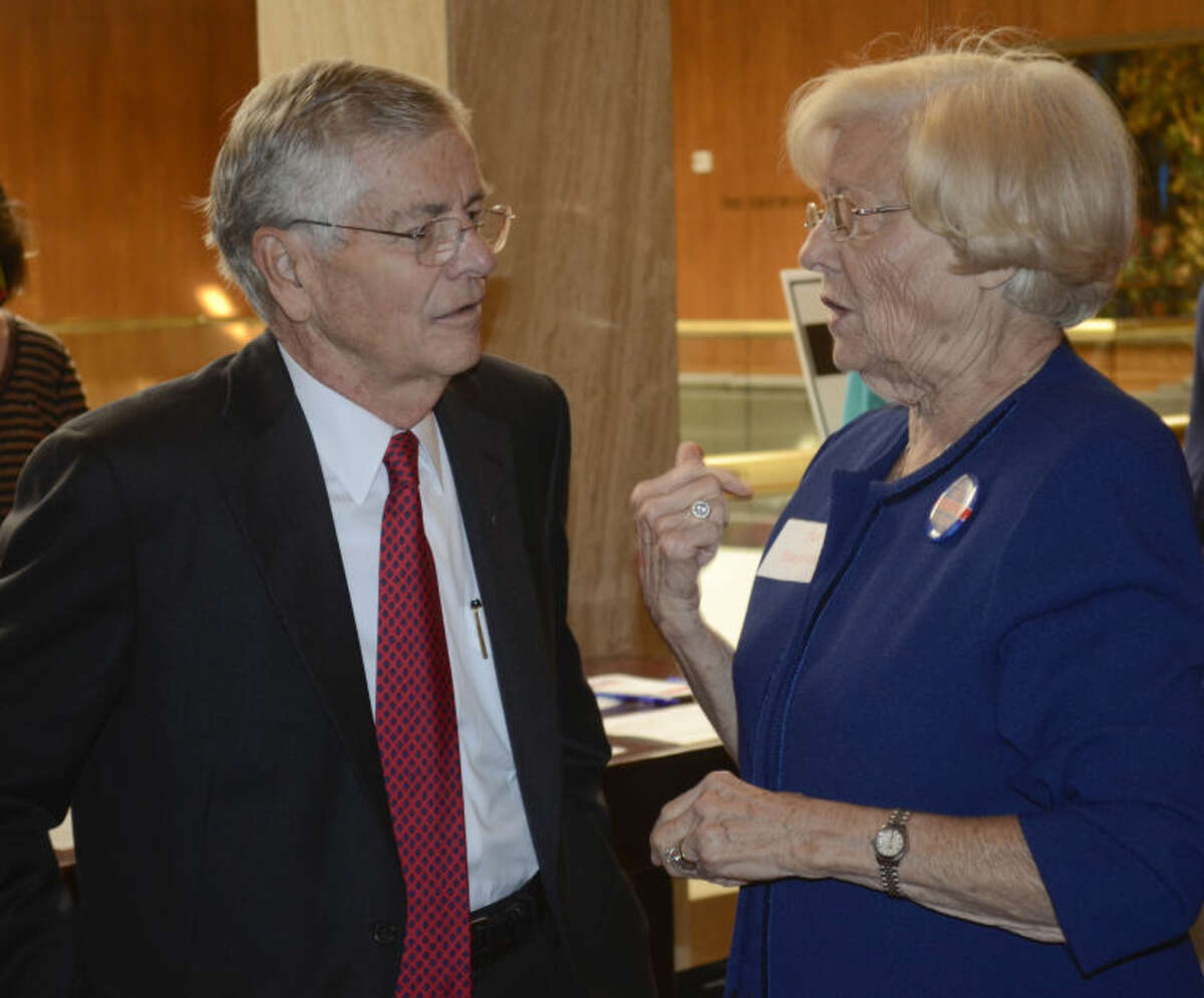 Texas Senator Tom Craddick talks with Pat Blackwell Wednesday afternoon before the Midland County Republican Women's luncheon. Tim Fischer\Reporter-Telegram