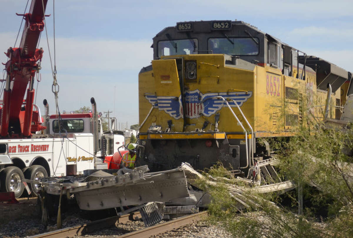 No one was injured after a semi and trailer were hit by a train Wednesday morning off E. Highway 80 near Loop 250. Tim Fischer\Reporter-Telegram
