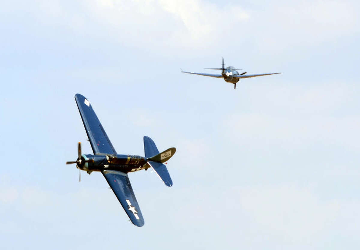 World War II aircraft perform during the Commemorative Air Force AirSho 2013 at Midland International Aiport. James Durbin/Reporter-Telegram