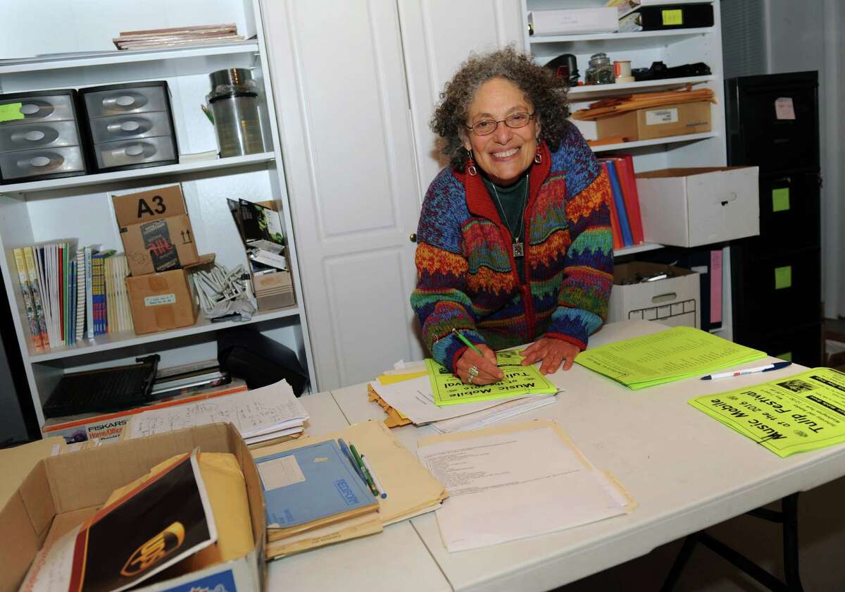 Ruth Pelham, who ran the Music Mobile for 39 year, works on flyers for the Tulip Festival in her home on Wednesday, May 4, 2016 in Albany N.Y. (Lori Van Buren / Times Union)