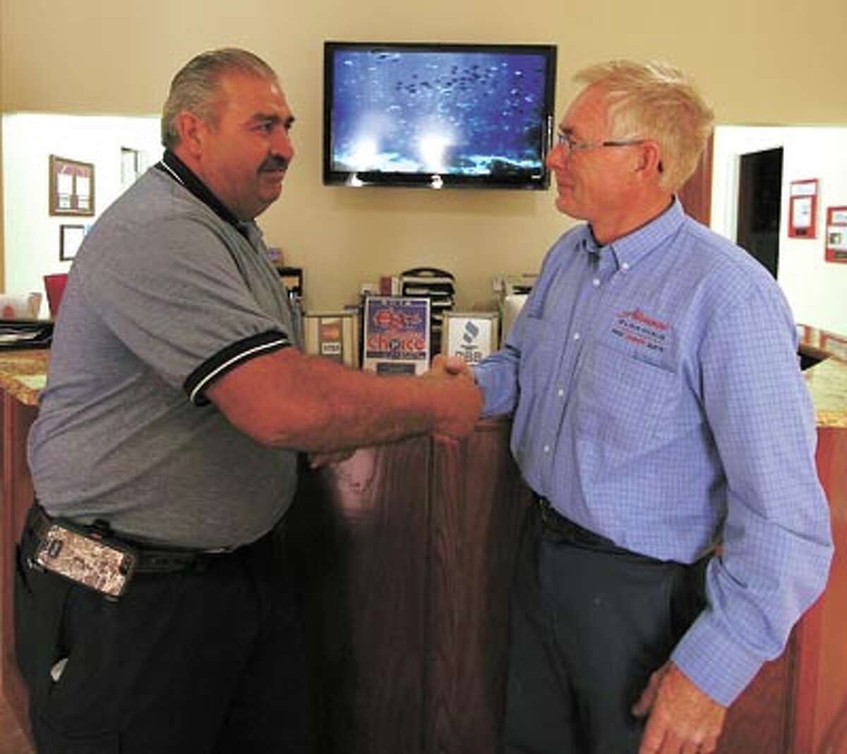 Advance Cleaning’s Holman Padgett, right, welcomes longtime area expert Joe Balli to the staff. Call Advance Cleaning for help with fire or flood damage or for basic carpet and floor cleaning. Their phone number is 550-8325.