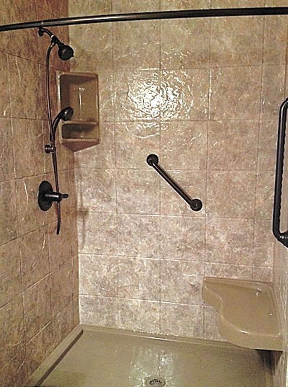 Homeowners Marco and Andrea Montes “absolutely love” the job Luxury Bath did in their shower. Call Luxury Bath now, at 218-6448 to schedule your bath beautification for next year.