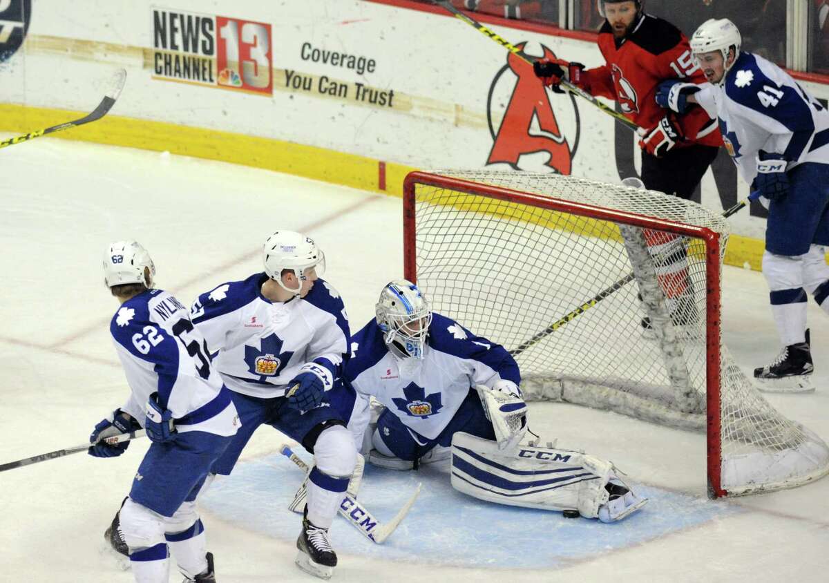 Toronto goalie Antoine Bibeau makes a save during their American Hockey League quarterfinal playoff series against the Albany Devils at the Times Union Center on Tuesday May 10, 2016 in Albany , N.Y. (Michael P. Farrell/Times Union)