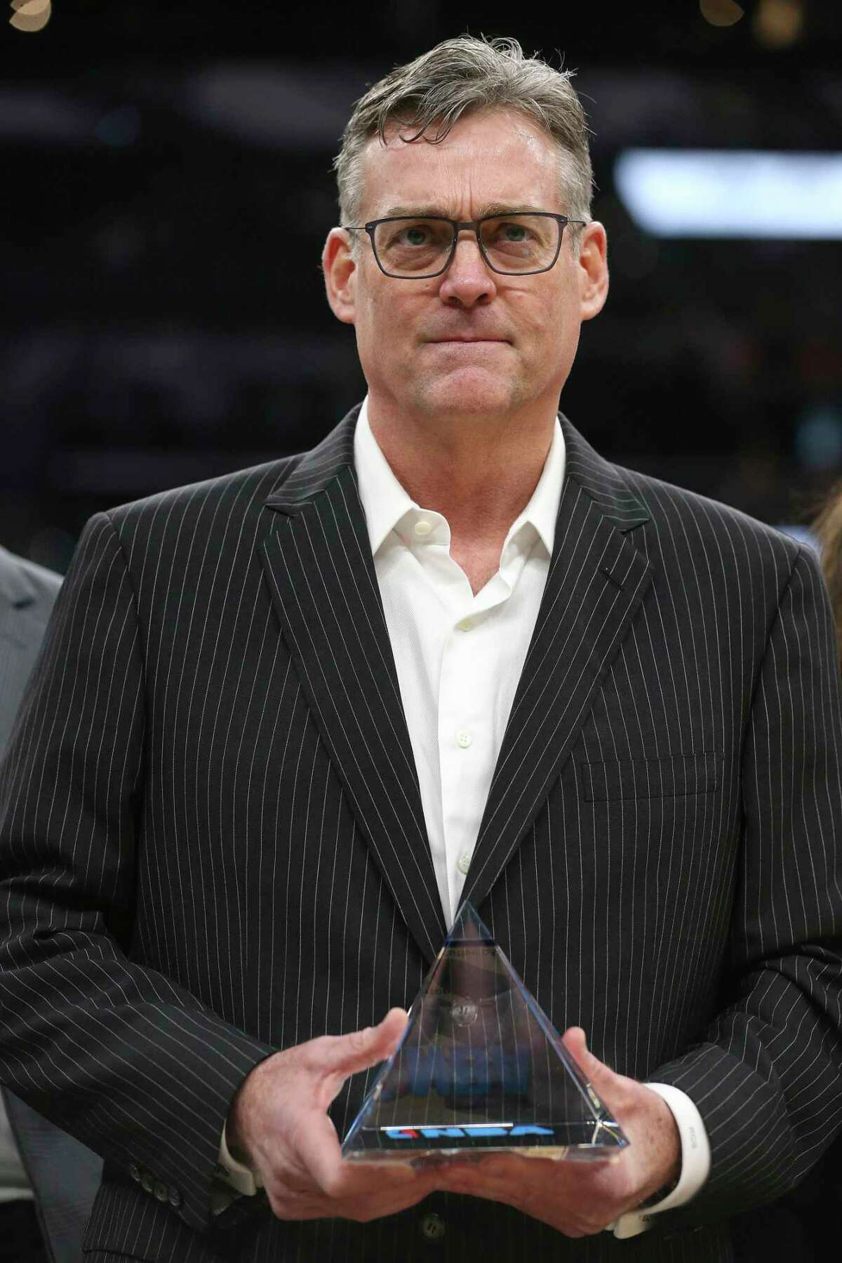 San Antonio Spurs General Manager R.C. Buford is presented with the National Basketball Association executive of the year award before game five in the Western Conference semi finals against the Oklahoma City Thunder at the AT&T Center, Tuesday, May 10, 2016.