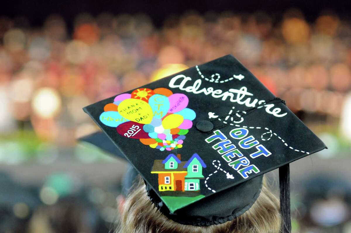 A graduate sends a message of excitement and gratitude via her mortar board during Skidmore College commencement exercises on Saturday, May 16, 2015, at Saratoga Performing Arts Center in Saratoga Springs, N.Y. (Cindy Schultz / Times Union)