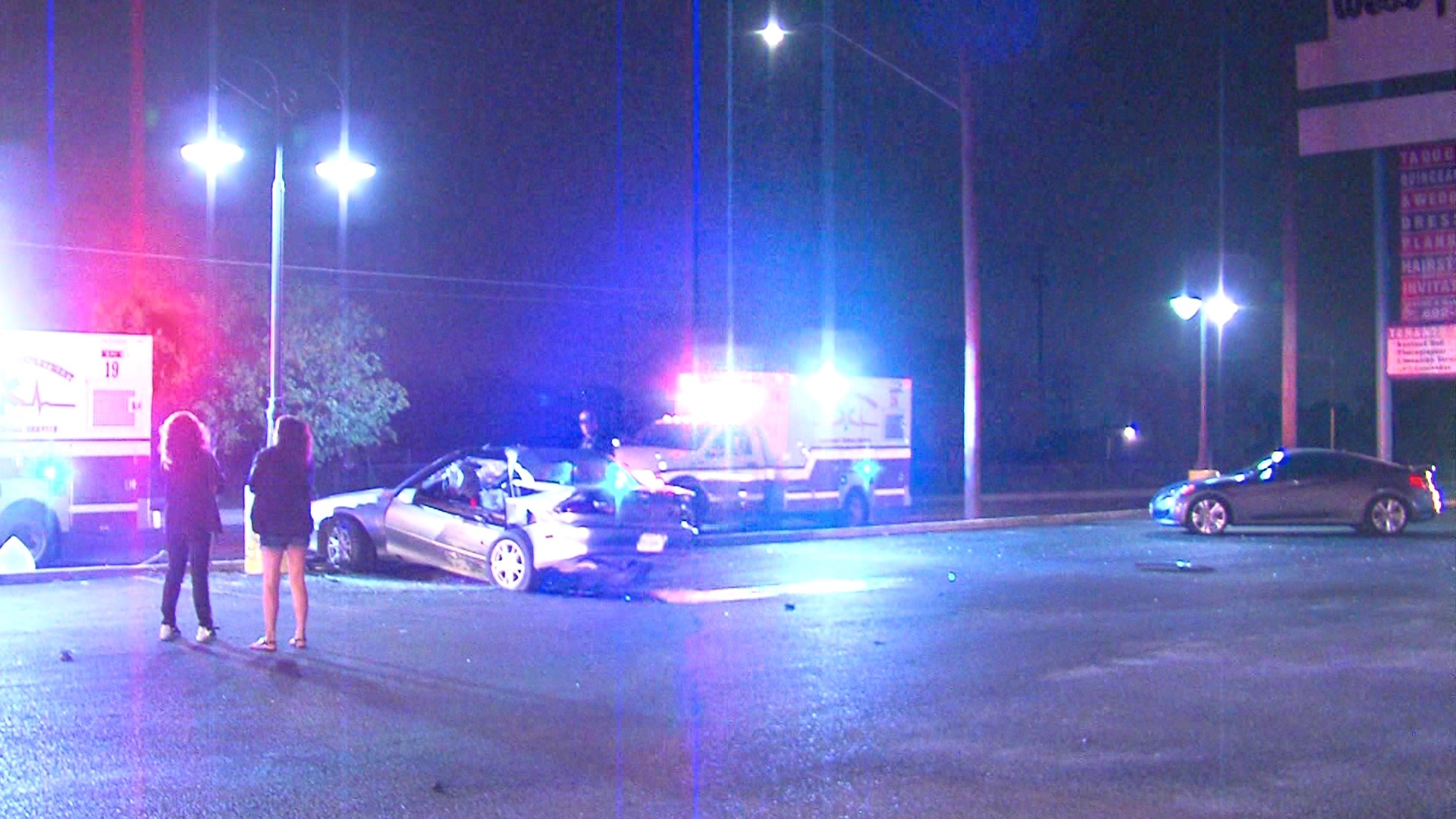 Woman dies after crashing into light pole on North Side