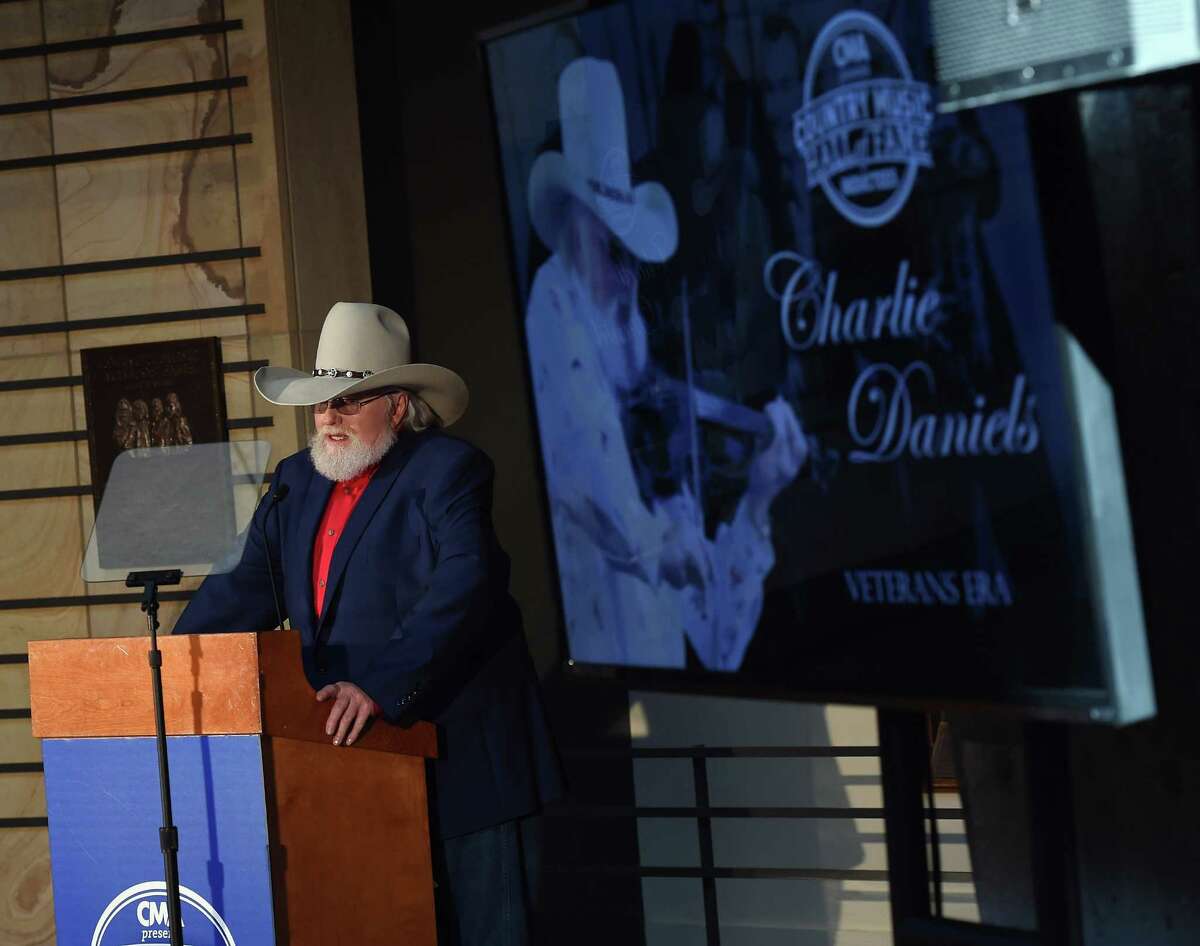Charlie Daniels address the crowd at his induction into the Country Music Hall of Fame in Nashville, Tennessee, in March.
