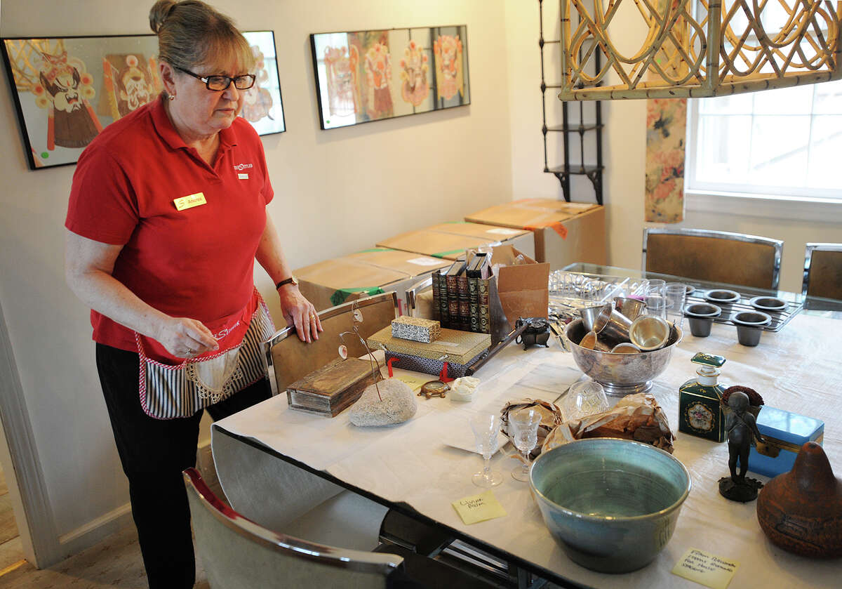 The Settlers employee Andrea Woodworth has items organised for packing at the home of company client Karley Meltzer in Westport, Conn. on Thursday, April 7, 2016.
