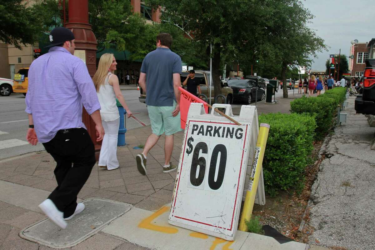 Parking can be at a premium in downtown Houston, especially during special events. A city project would put parking information on message signs to help direct drivers to optional spaces in private garages.