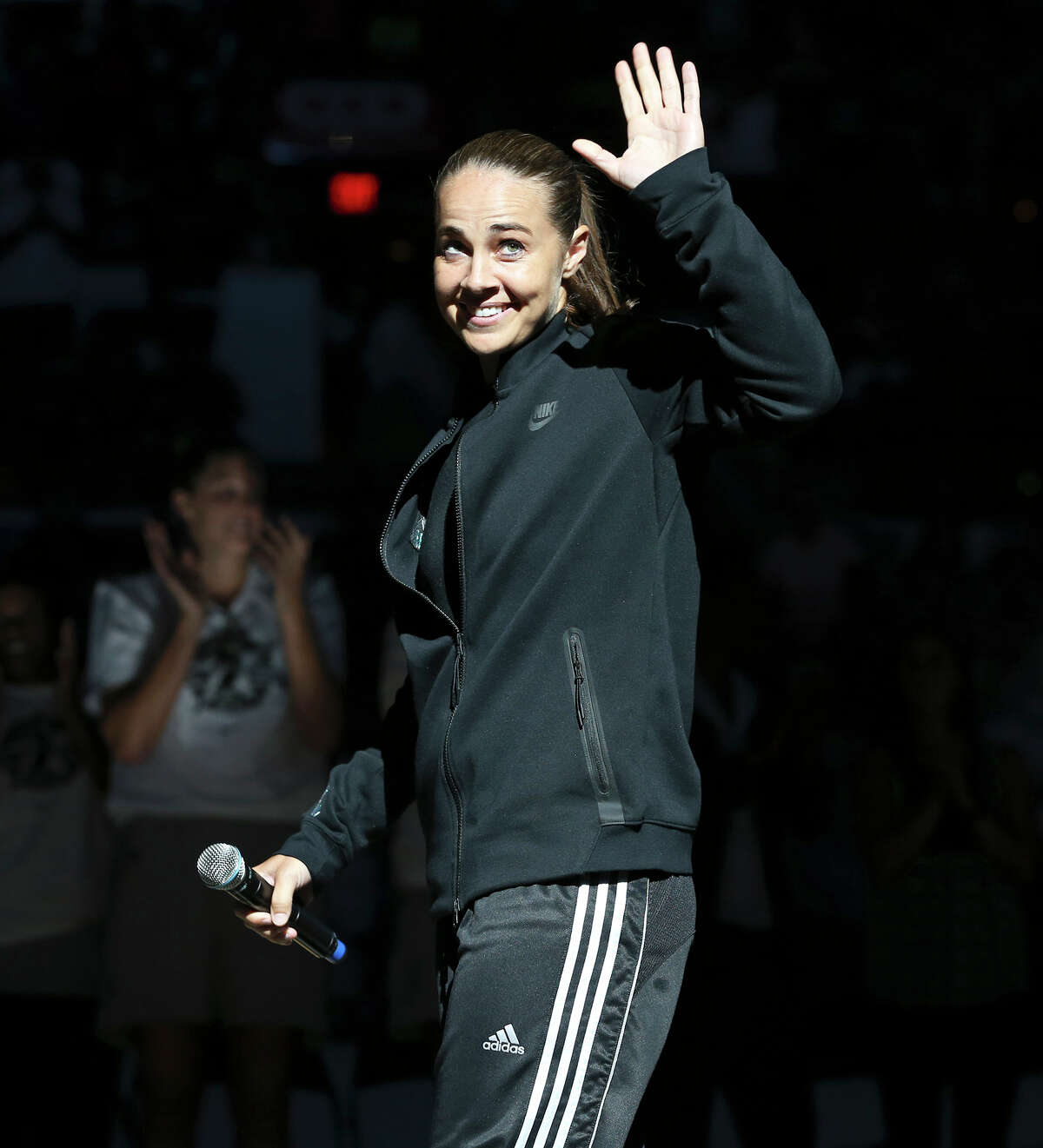 Becky Hammon waves to the fans during her retirement ceremony as the Stars play the Minnesota Lynx in the last regular season home game of the year on Aug. 15, 2014.