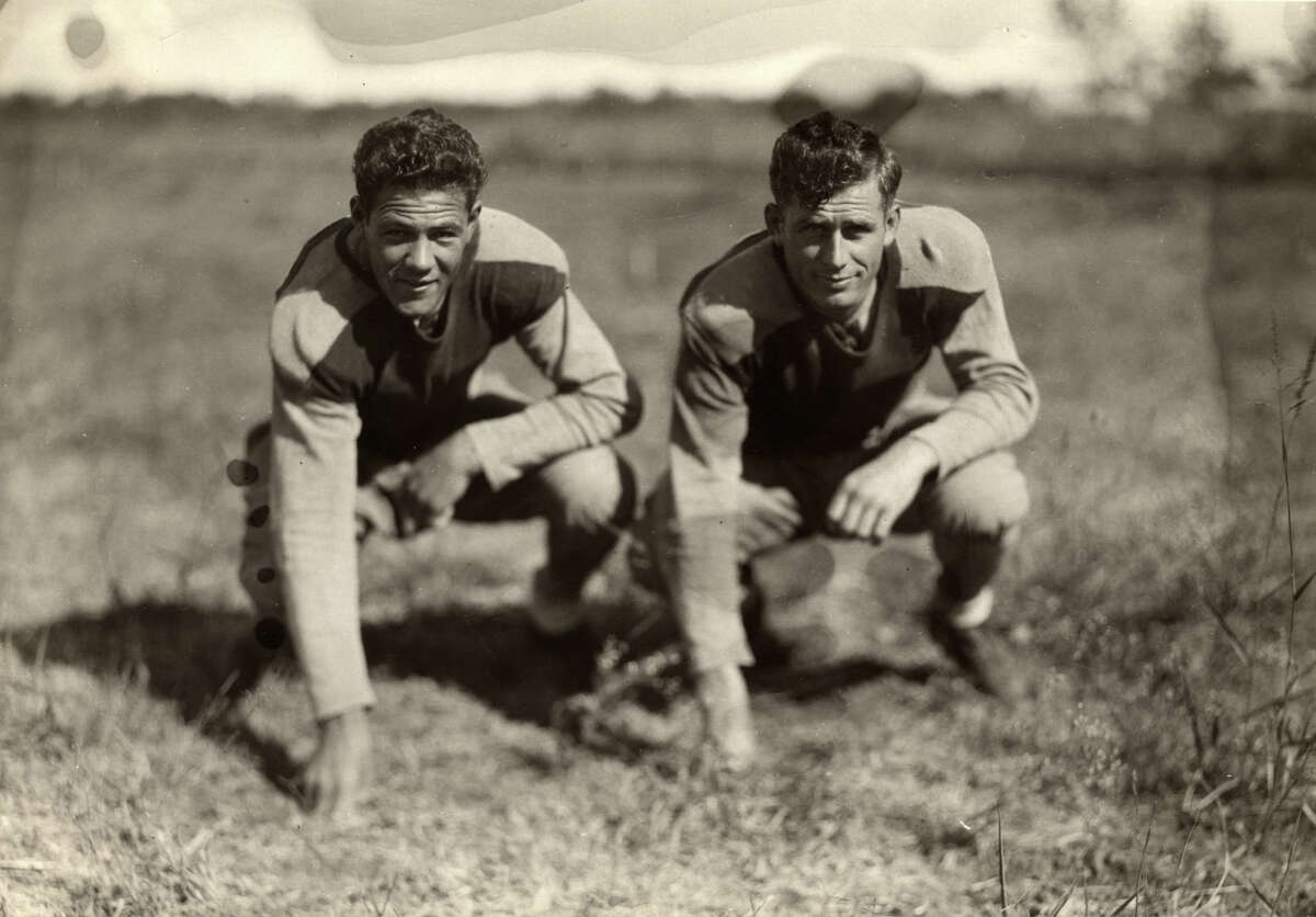 St. Mary's University football players wore long sleeves and pants in the 1920s. It was probably hot as hell without cooling air conditioning, but they still had great hair. 