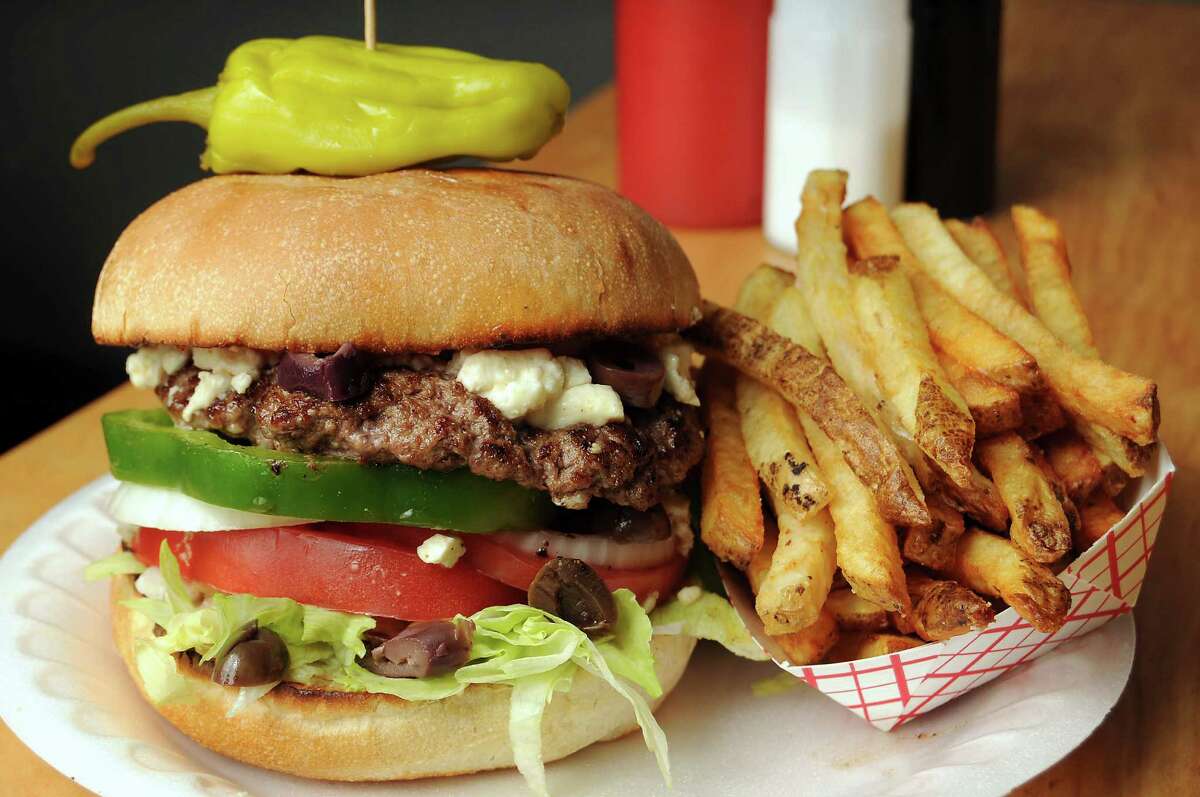 A Greek burger and twice-fried fries at Hubcap Grill