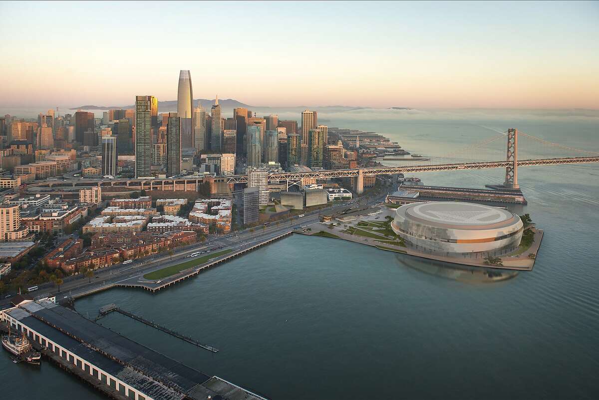 Aerial view of the Golden State Warriors proposed arena and neighboring development across the Embarcadero. The team�s redesign being released Tuesday includes trimming the perimeter height of the arena and lowering public plazas to make them more welcoming to pedestrians.