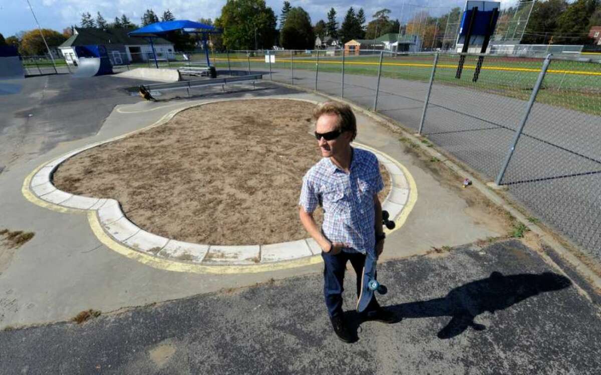 Charlie Samuels standing in front of the skate bowl before the park was re-opened. Skip Dickstein/ Times Union