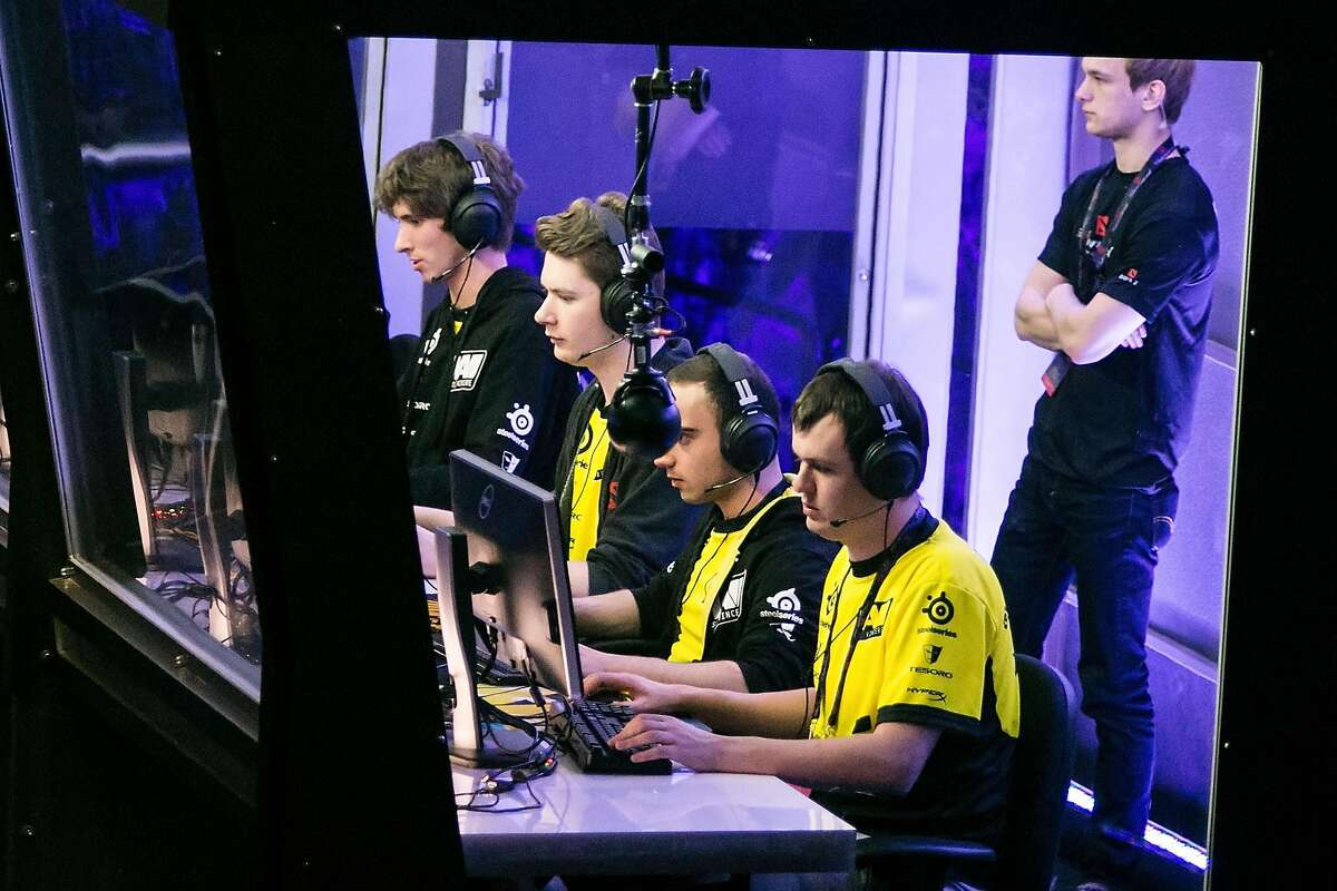 SEATTLE, WA - JULY 19: XBOCT, Kuroky, Puppey, and Dendi of Natus Vincere compete at The International DOTA 2 Championships at Key Arena on July 19, 2014 in Seattle, Washington.