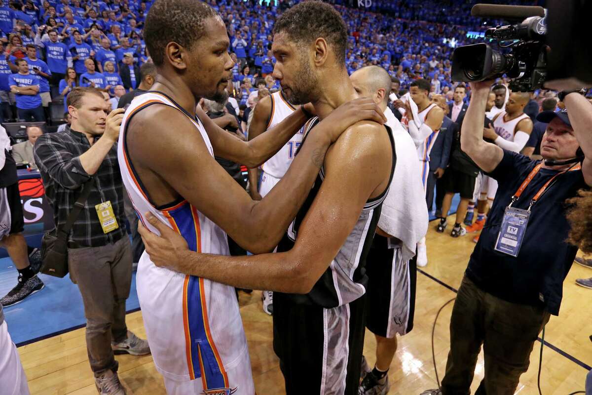 Oklahoma City Thunder’s Kevin Durant and the Spurs’ Tim Duncan talk after Game 6 in the Western Conference semifinals on May 12, 2016 at Chesapeake Energy Arena.