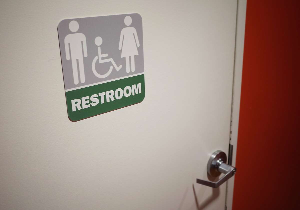 (FILES) This file photo taken on May 5, 2016 shows a gender neutral bathroom at a restaurant in Washington, DC. President Barack Obama's administration fired the latest salvo May 13, 2016 in a heated battle over the rights of transgender Americans, telling schools they must allow students to use bathrooms of their choosing.In a letter to school districts and universities, officials from the Justice and Education Departments outlined how to prevent discrimination against transgender students and what Attorney General Loretta Lynch described as "unjust" school policies. / AFP PHOTO / MANDEL NGANMANDEL NGAN/AFP/Getty Images