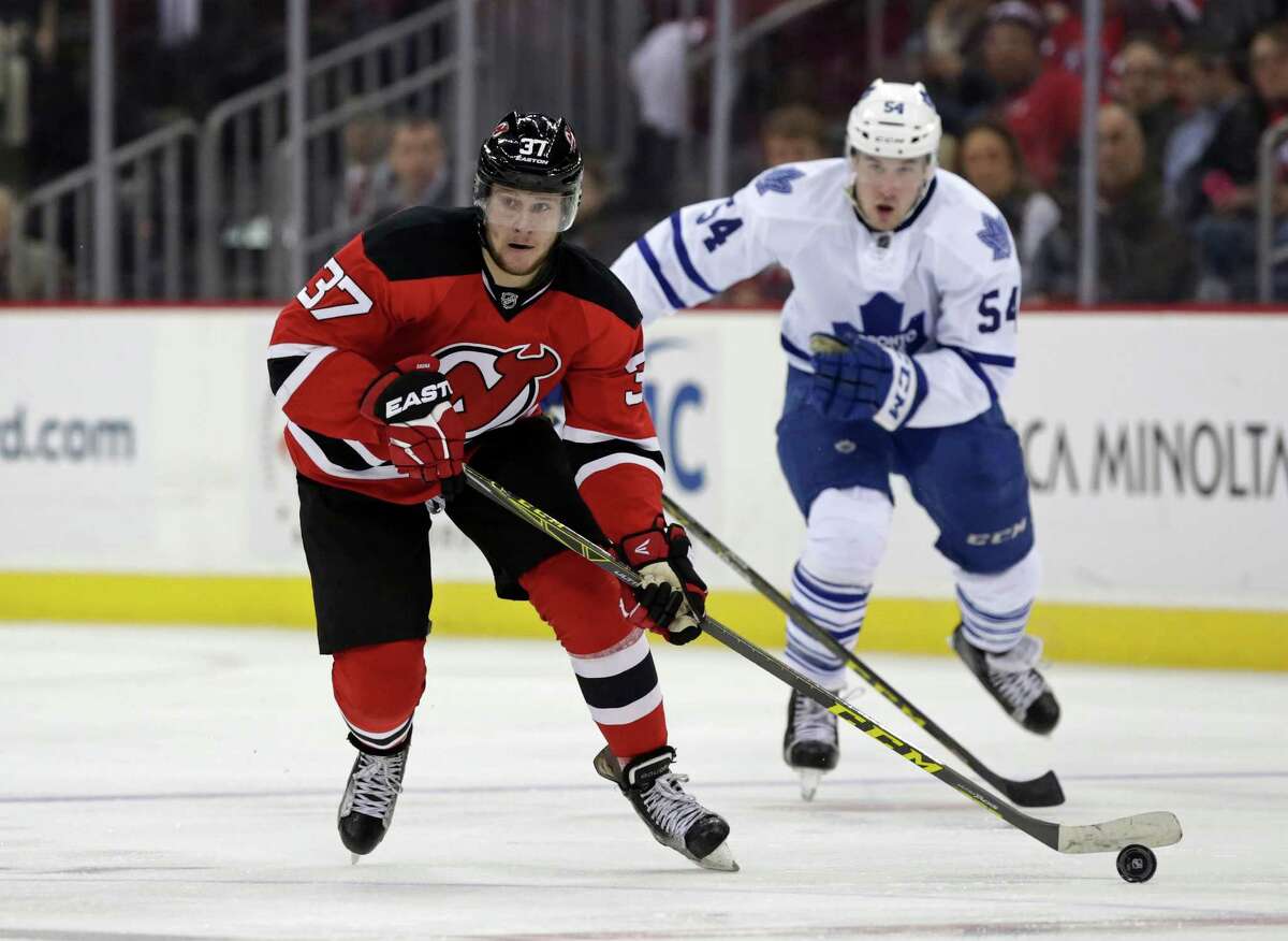 NEWARK, NJ - APRIL 9: Pavel Zacha #37 of the New Jersey Devils in action against the Toronto Maple Leafs during the second period at the Prudential Center on April 9, 2016 in Newark, New Jersey. (Photo by Adam Hunger/Getty Images) ORG XMIT: 574716087