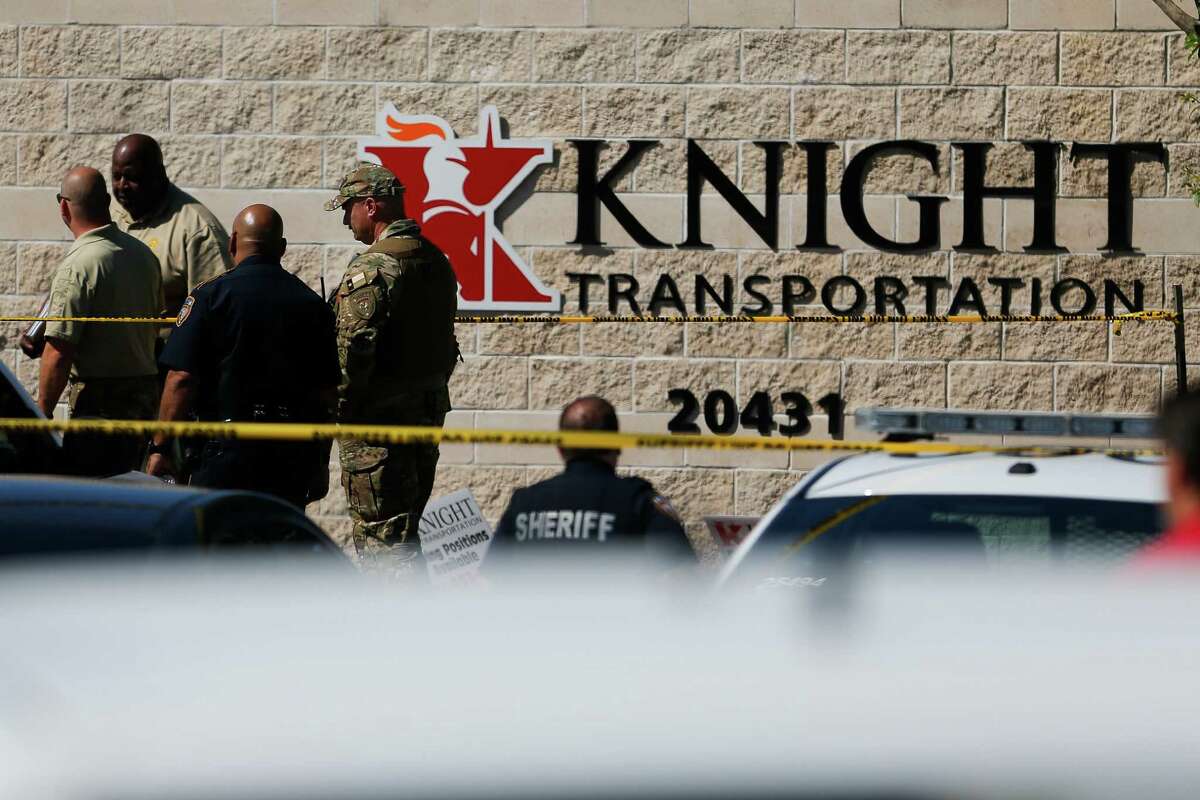 Sheriffs deputies surround Knight Transportation after an employee who was terminated earlier returned to the business with a shotgun and handgun and killed a former coworker and then himself Wednesday, May 4, 2016 in Katy. Two other employees were injured from flying shrapnel and an officer injured his knee as he entered the building. ( Michael Ciaglo / Houston Chronicle )