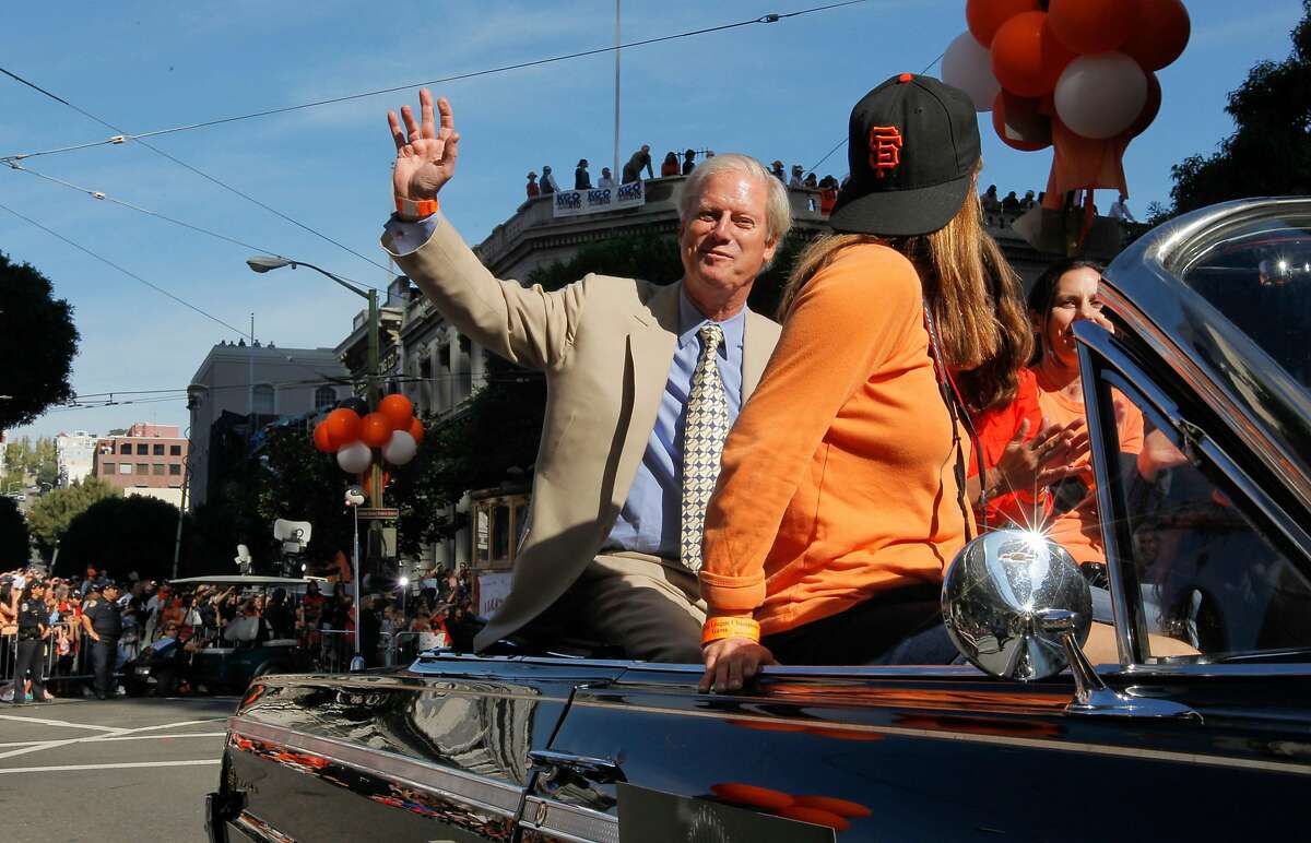 Former managing general partner of the San Francisco Giants Peter Magowan waves to fans along the route, as the City of San Francisco celebrates the World Series Champion Giants with a parade down Market Street, on Wednesday Nov. 3, 2010 in San Francisco, Calif.
