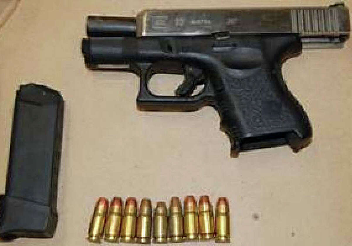 Illegal handgun and bullets seized by State Police during a raid in Bridgeport.