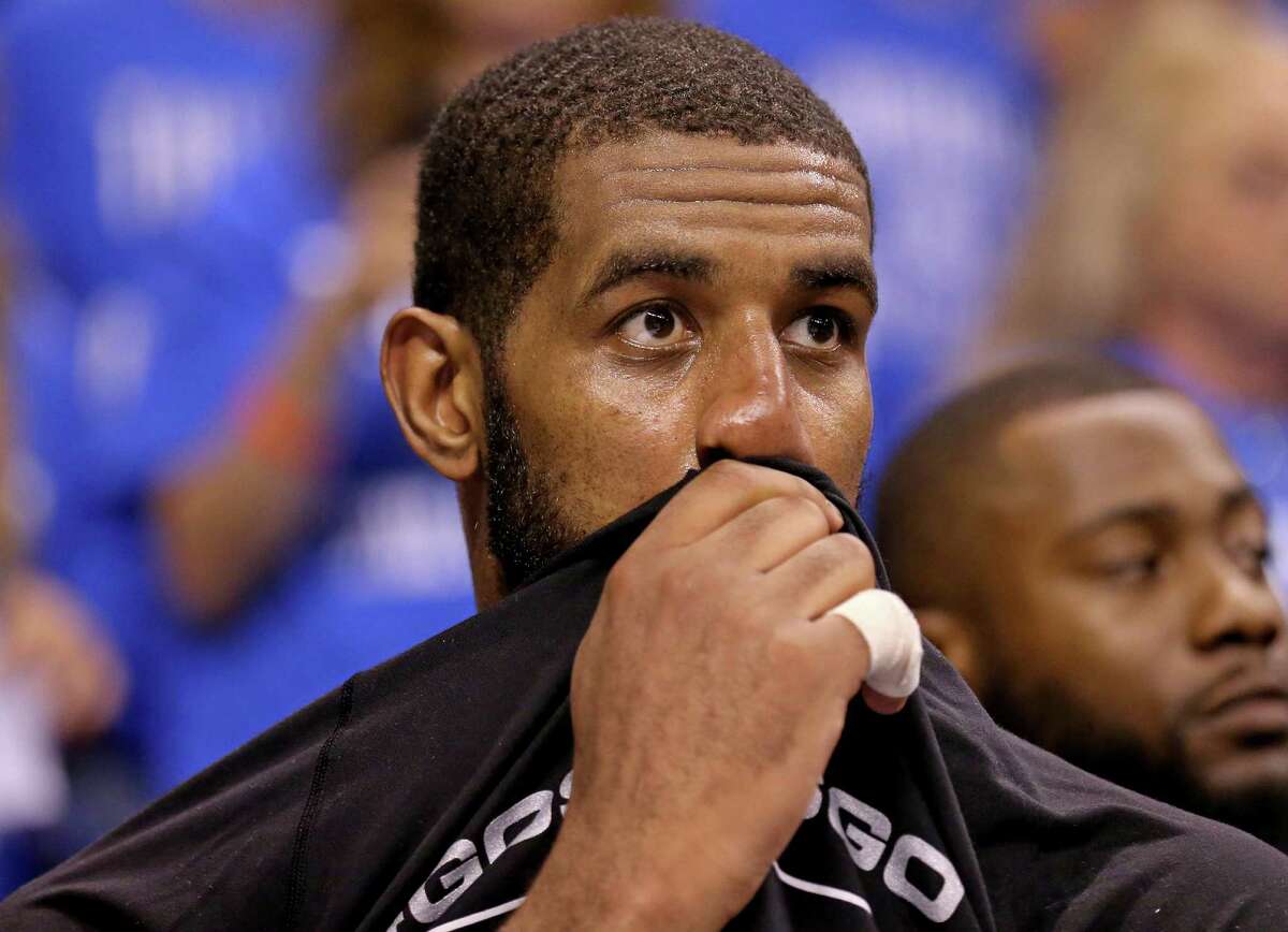 San Antonio Spurs' LaMarcus Aldridge sits on the bench during second half action of Game 6 in the Western Conference semifinals against the Oklahoma City ThunderThursday May 12, 2016 at Chesapeake Energy Arena in Oklahoma City, Oklahoma. The Thunder won 113-99.