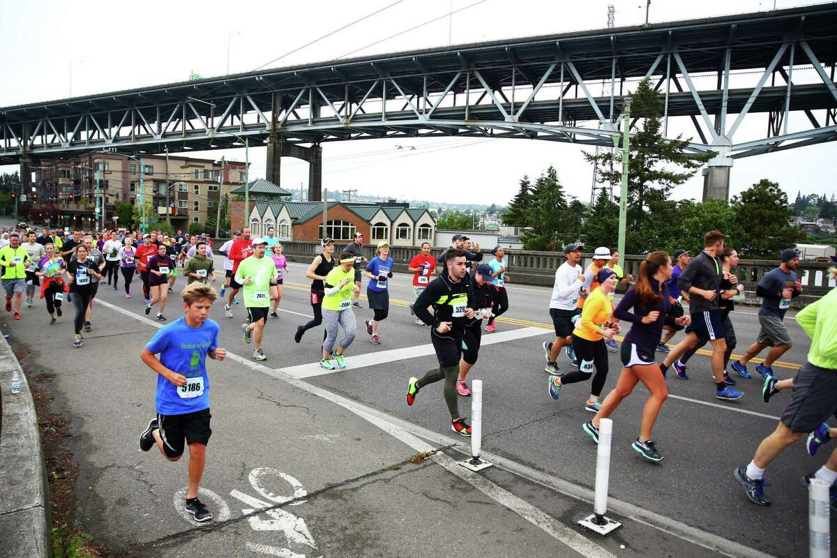 Participants run in the 34th annual Beat the Bridge to Beat Diabetes race, Sunday, May 15, 2016. Thousands participated in the race and fundraising event for the Juvenile Diabetes Research Foundation that raised money for type 1 diabetes research. The event consists of an 8K run and, a 3-mile walk, a 1-mile fun run and the Diaper Derby for toddlers.