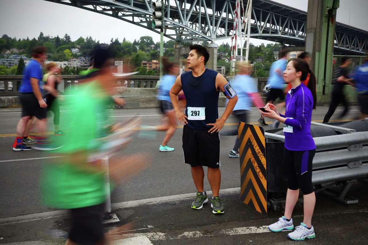 Participants run across the University Bridge in the 34th annual Beat the Bridge to Beat Diabetes race, Sunday, May 15, 2016. Thousands participated in the race and fundraising event for the Juvenile Diabetes Research Foundation that raised money for type 1 diabetes research. The event consists of an 8K run and, a 3-mile walk, a 1-mile fun run and the Diaper Derby for toddlers.