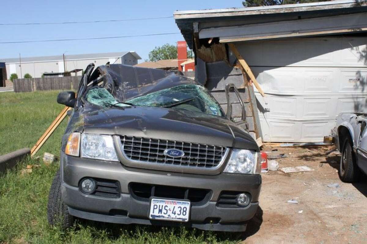 Car rolls over, then rolls over car (+PHOTOS)