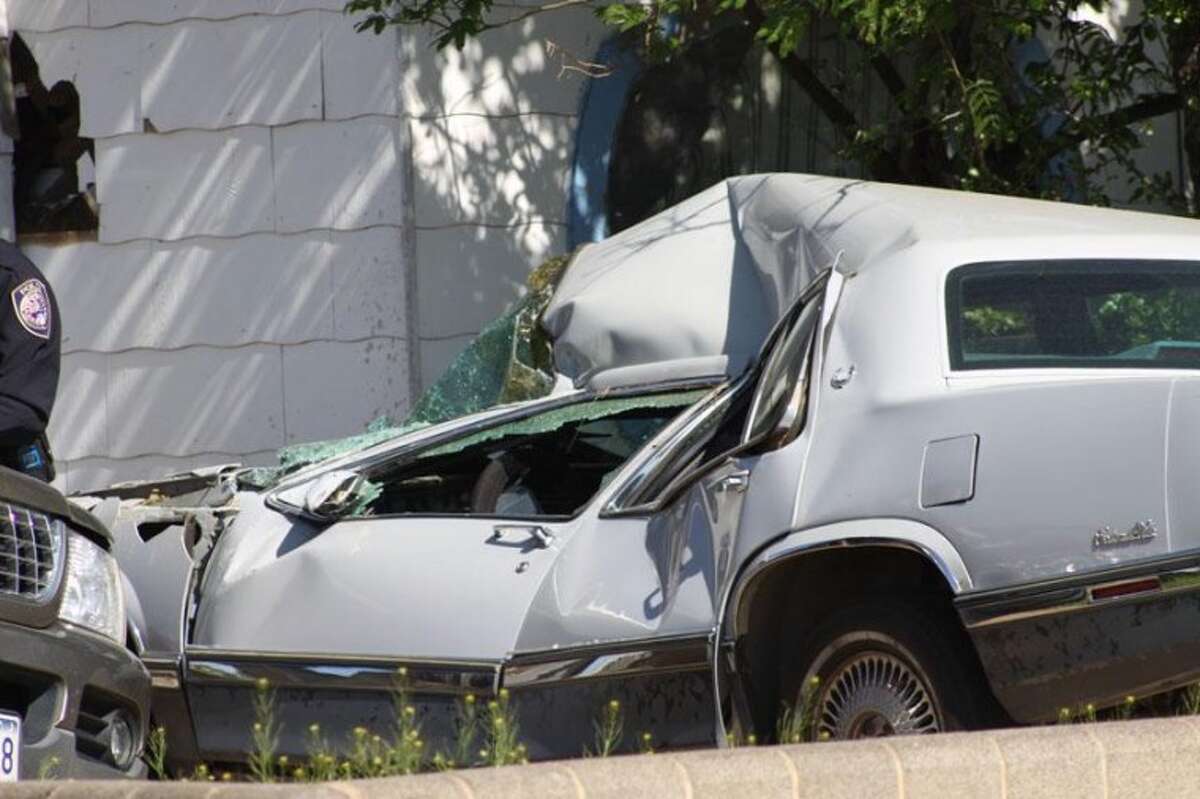 Car rolls over, then rolls over car (+PHOTOS)