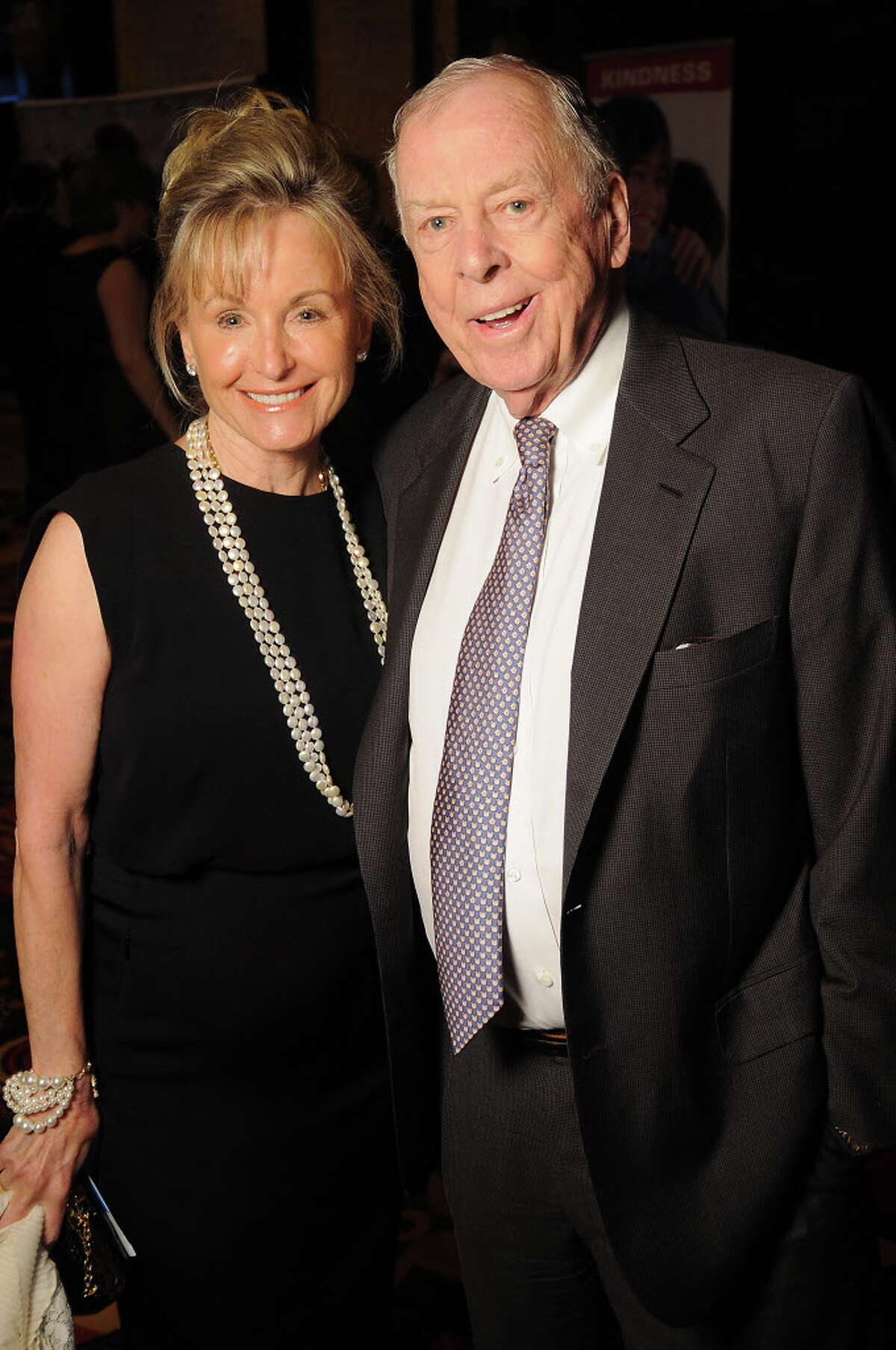 Chuck Norris' martial arts gala nabs 800k, honors Gallery Furniture owners