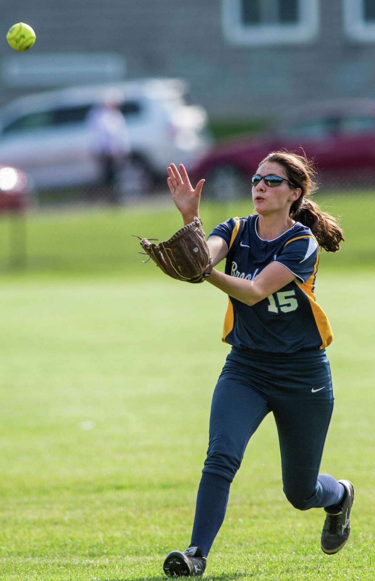 FILE PHOTO: Brookfield high school outfielder Heather Morey makes a catch during a first round game of the CIAC girls softball tournament against New Fairfield high school played at Brookfield high school, Brookfield, CT on Wednesday, June 3rd, 2015.