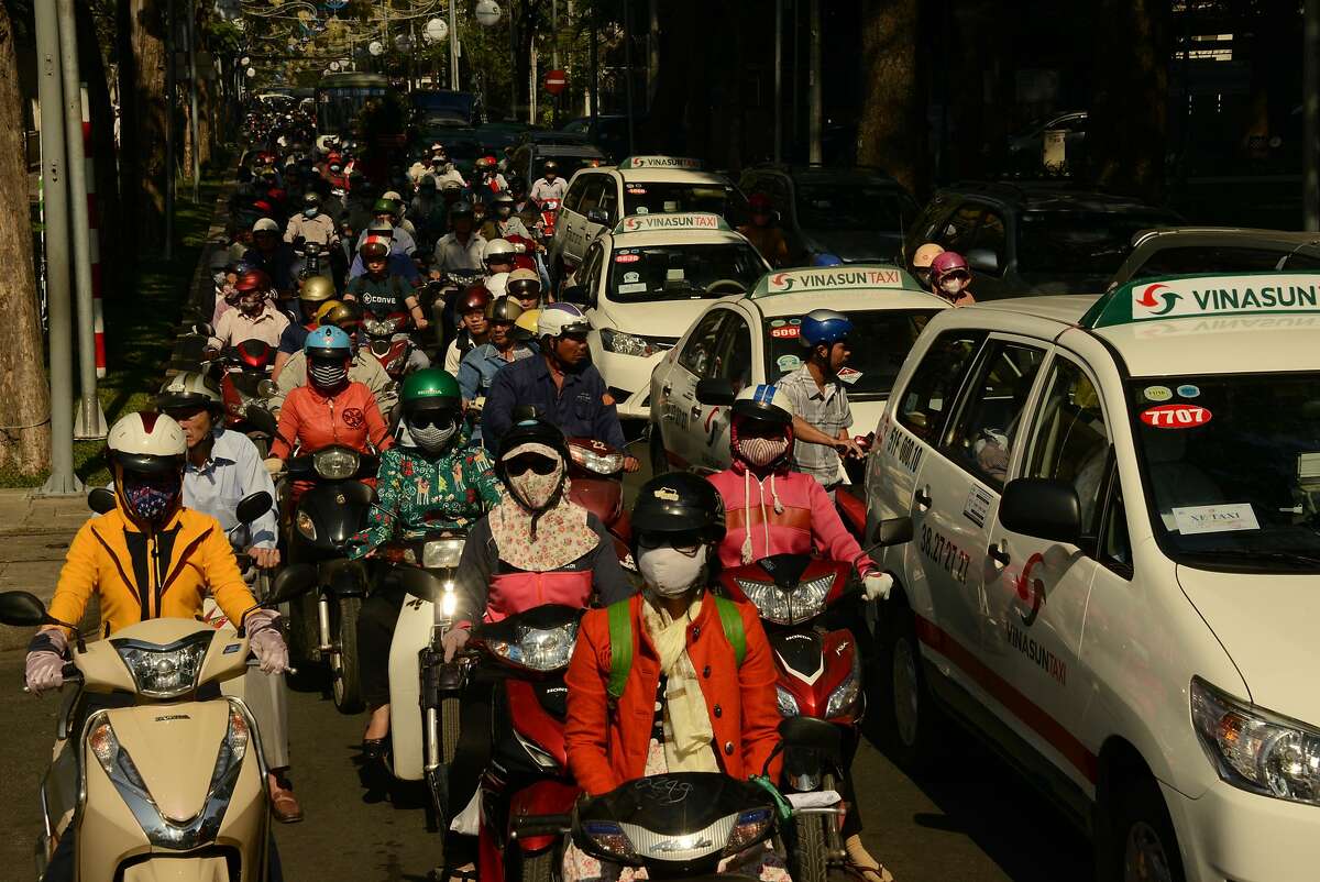 Saigon's chaotic whirl of traffic can be intimidating, but a trip on a motorcycle taxi is a great way to get around the city.