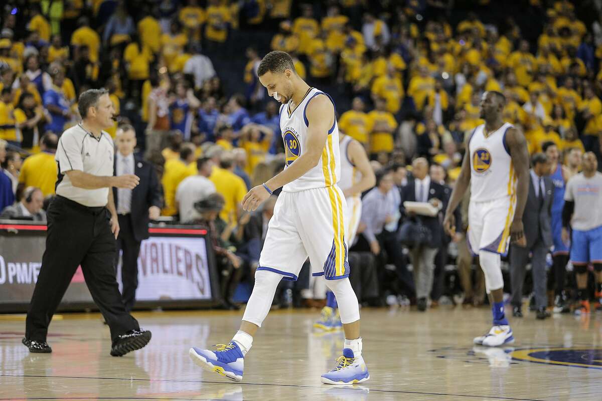 Golden State Warriors Stephen Curry walks off the court after the Warriors were defeated by the Oklahoma City Thunders 108 to 102 during Game 1 of the NBA Western Conference Finals at Oracle Arena on Monday, May 16, 2016 in Oakland, Calif.