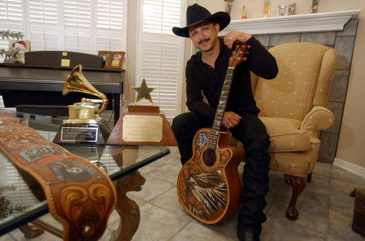 Legendary Tejano star Emilio Navaira with his guitar.