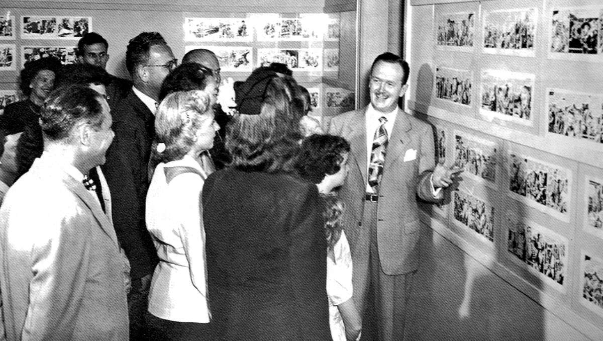 Alex Raymond, right, hosted a one-man exhibit of his original art at Stamford Museum in August 1948. Raymond, a longtime Stamford, Connecticut, resident, was best known for his work on the “Flash Gordon” and “Rip Kirby” comics. A few months later, the museum held an exhibit of several comics creators who lived in the area.