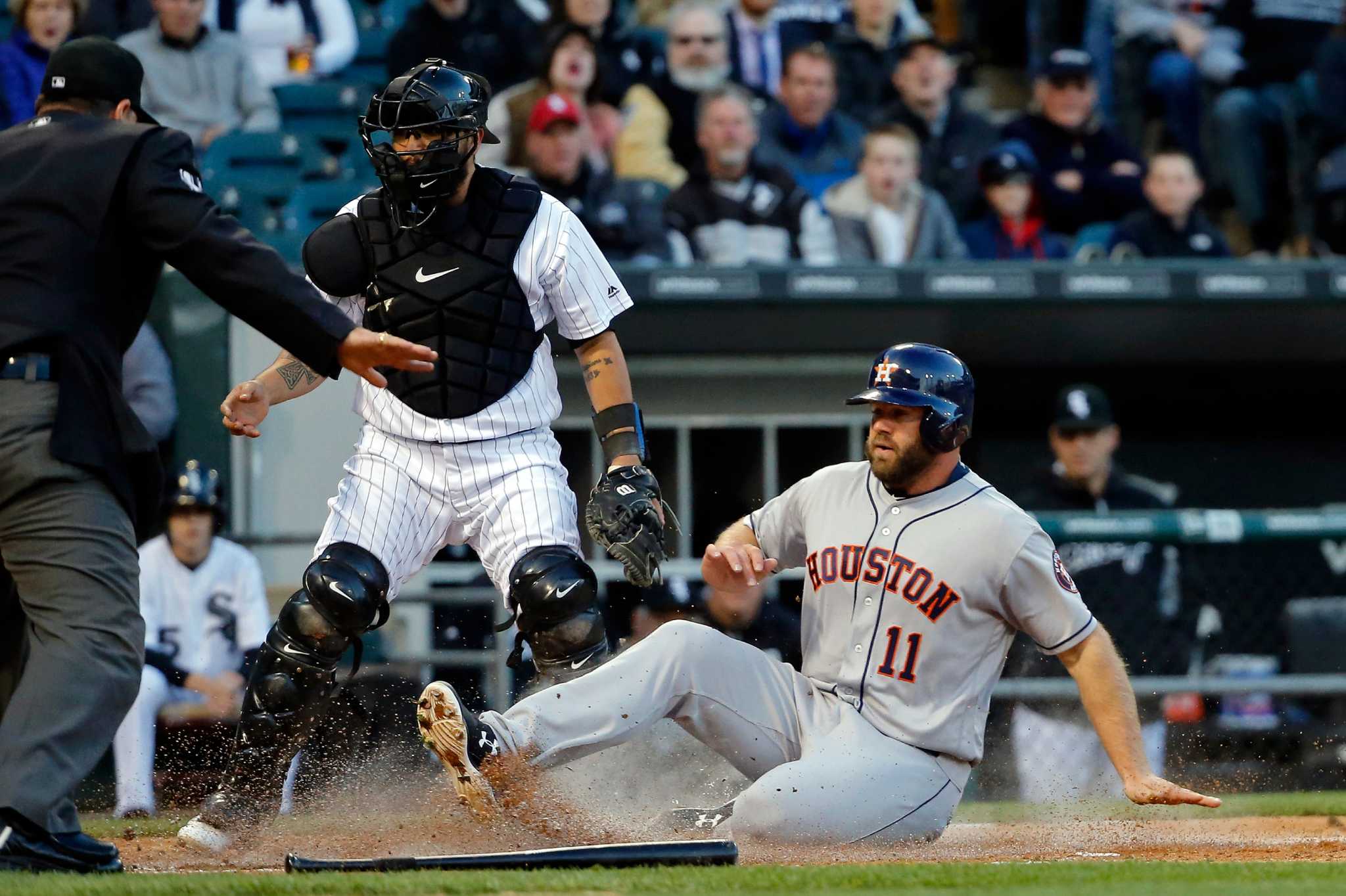 Evan Gattis helps Astros notch extra-innings win over White Sox