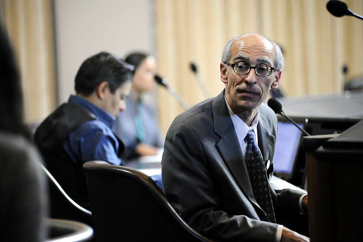 Council member Dan Kalb of District 1 listens to a member of the public give comments during an Oakland City Council held at City Hall in Oakland, CA Wednesday, July 7, 2015.