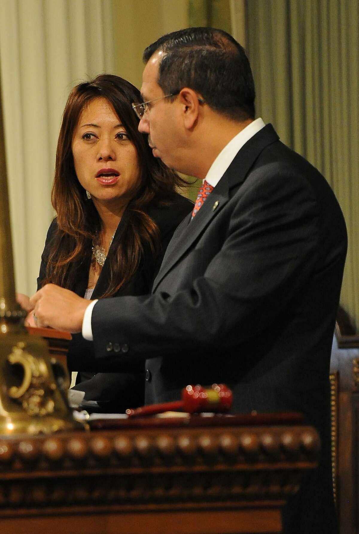 Assembly Members Fiona Ma and Tony Mendoza are seen during session in Sacramento on August 31, 2012. The Legislature met for its final day of the two-year legislative session.
