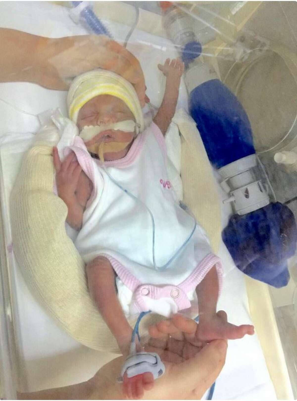 Baby Mia Villalonga came into the world 12 weeks early, weighing only a pound and a half, more than 6,000 miles away from home — leaving her parents stranded on vacation and struggling to pay for the costs of healthcare, according to a GoFundMe page started by her parents.