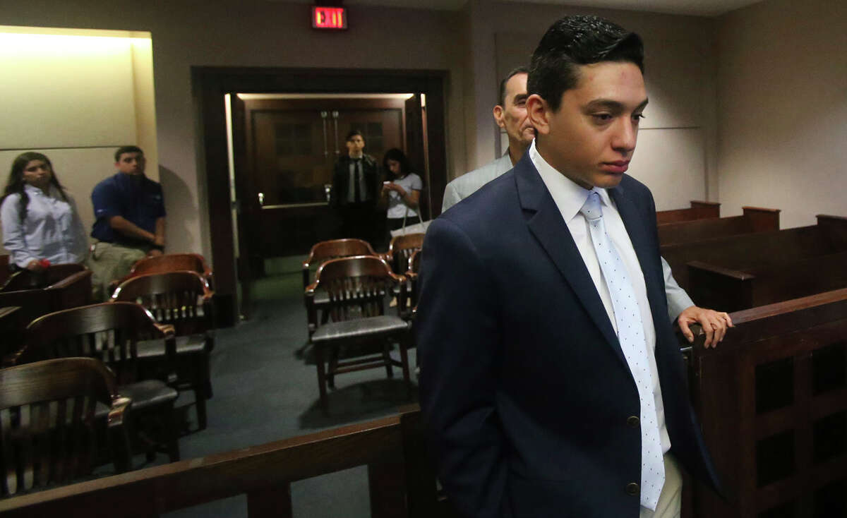 Defendant Antonio Flores,22, prepares to leave court Wednesday May 18, 2016 during his manslaughter trial in the 226th District Court. Flores is accused in the case of a car crash in which two high school girls died in 2013 during an alleged car race.