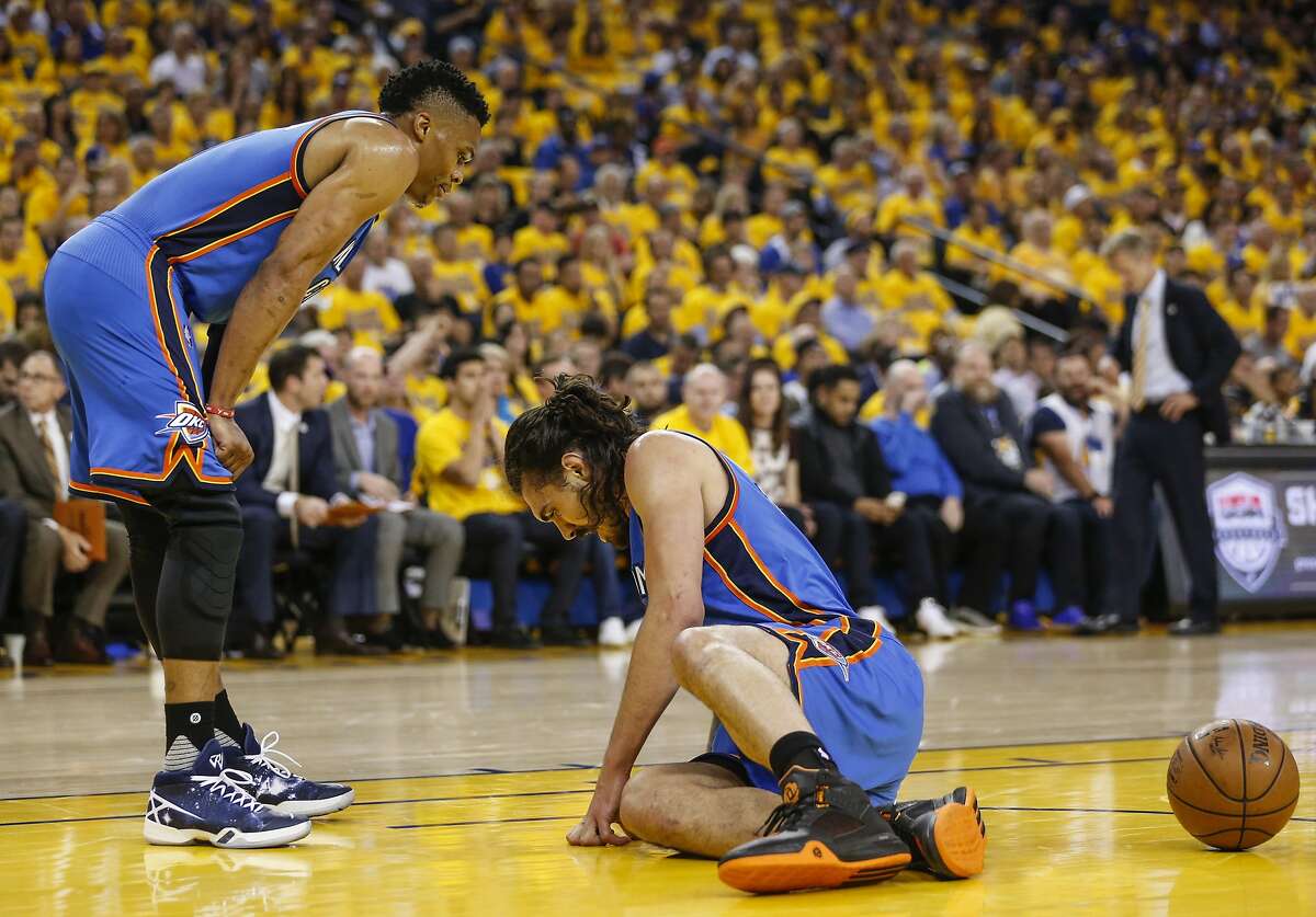 Oklahoma City Thunders� Steven Adams is slow getting up in the first quarter during Game 2 of the NBA Western Conference Finals at Oracle Arena on Wednesday, May 18, 2016 in Oakland, Calif.