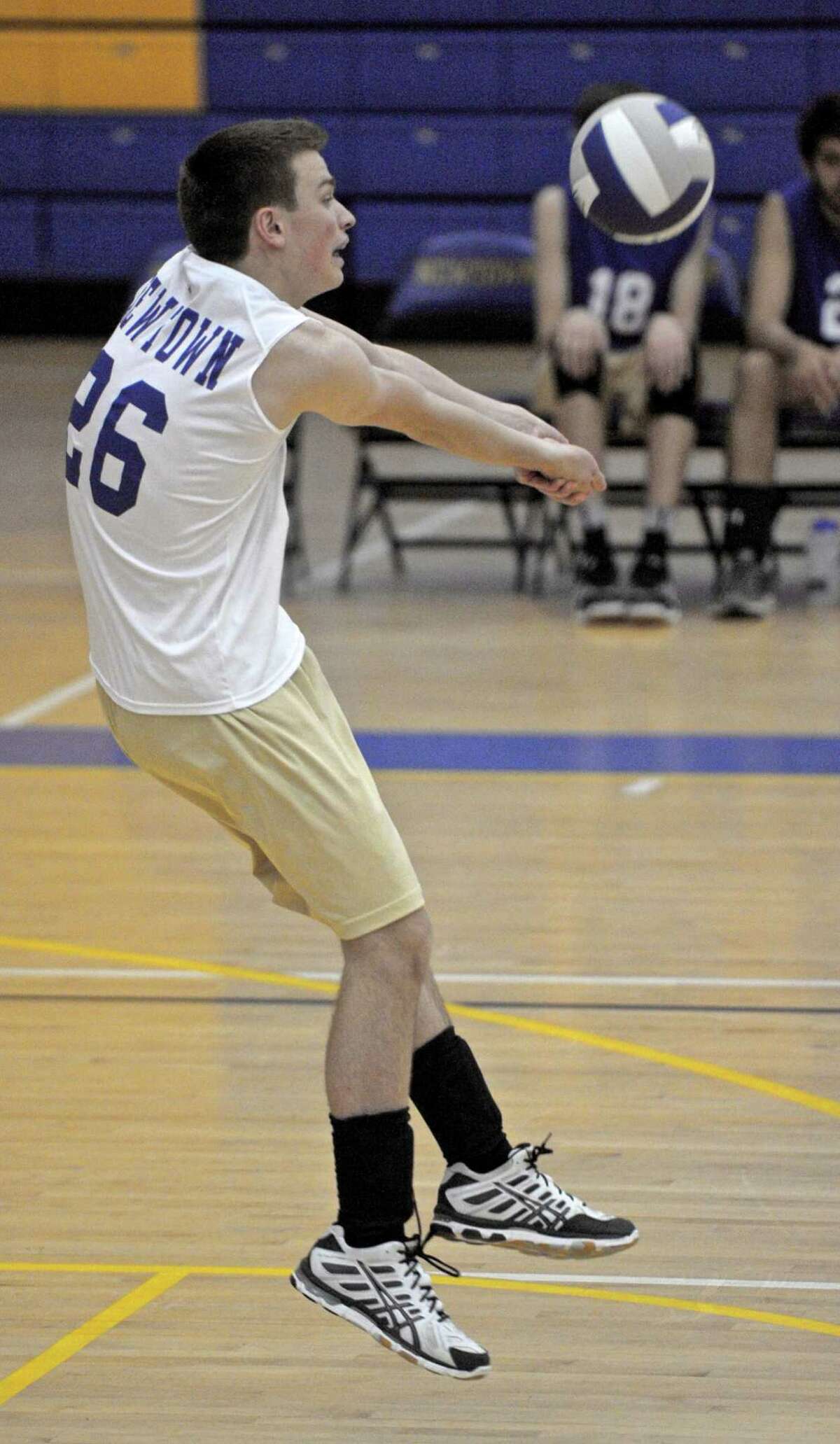 FILE PHOTO: Newtown's libero Jackson Fletcher (26) returns a serve during the boys high school volleyball game between Shelton and Newtown high schools on Wednesday, April 29, 2015, played at Newtown High School, Newtown, Conn.