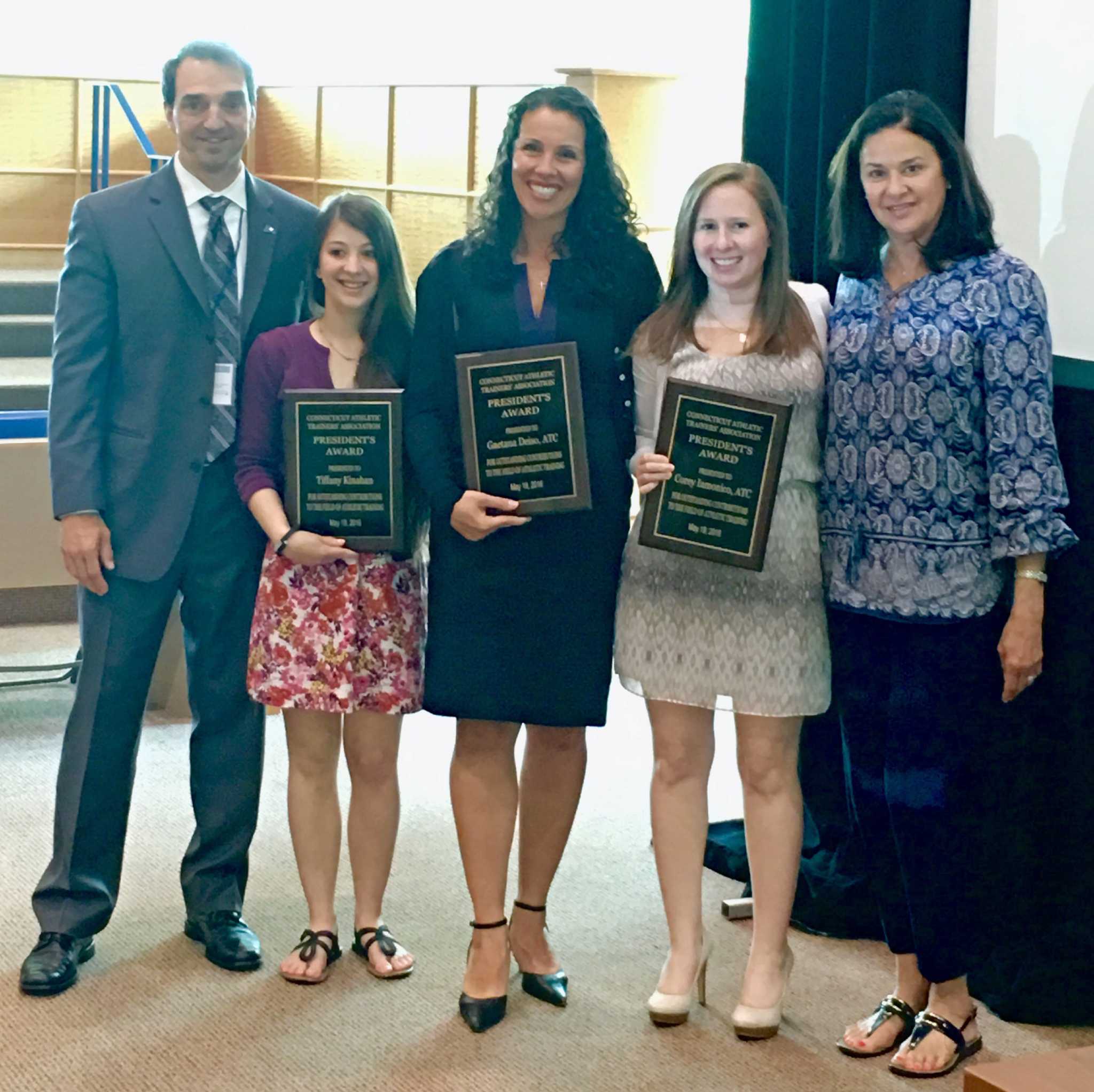 Staples athletic trainers presented with state association’s President’s Award